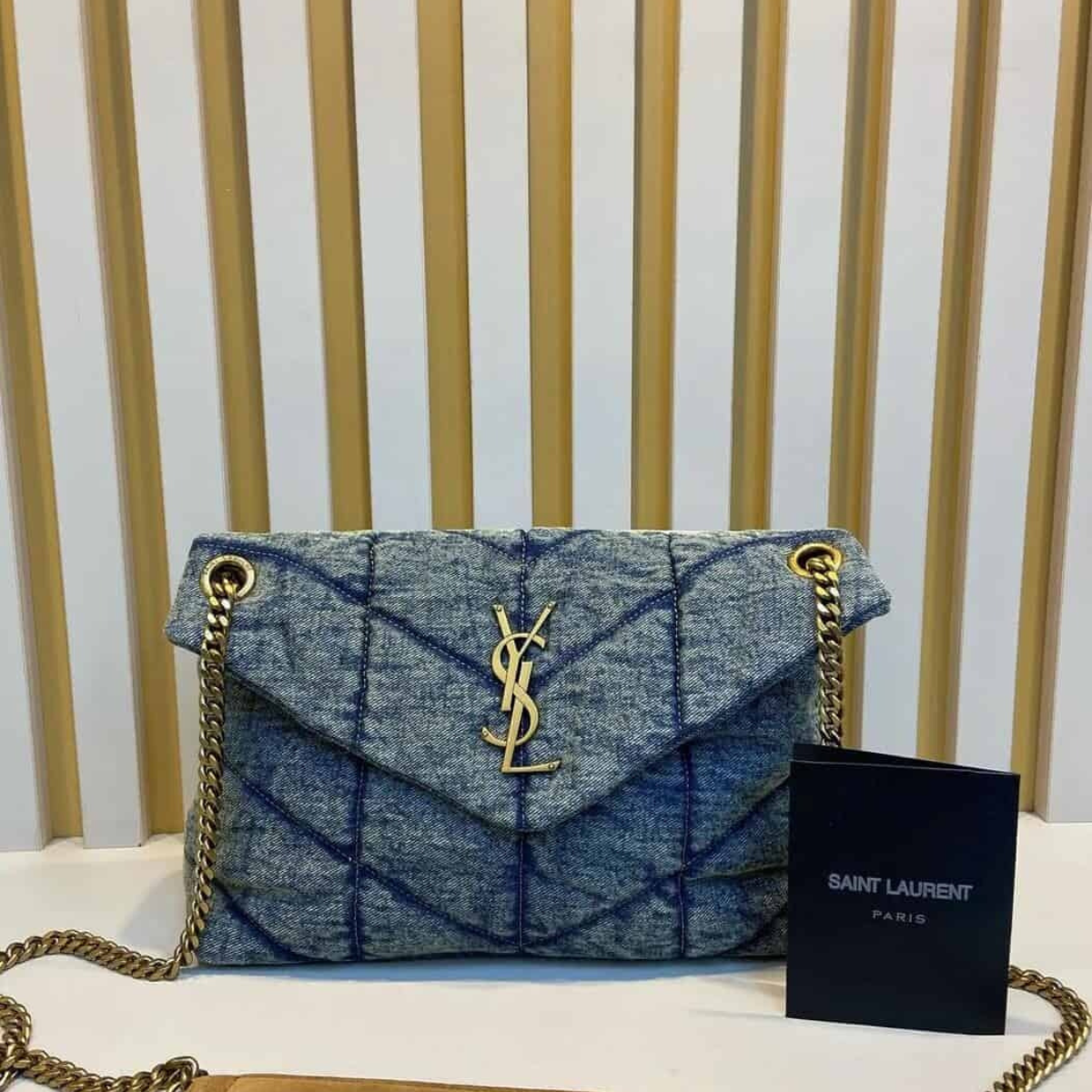 LOULOU PUFFER BAG IN QUILTED VINTAGE DENIM